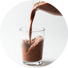 Image of a hand pouring a chocolate ensure nutrition shake.
