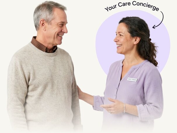 Friendly, professional woman speaking with a relaxed senior man. Above the woman it says "Your Care Concierge" with an arrow pointing to her.