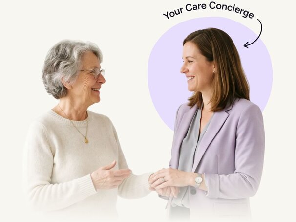 Friendly, professional woman speaking with a relaxed senior woman. Above the woman on the right it says "Your Care Concierge" with an arrow pointing to her.