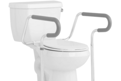 Toilet with helping rails
