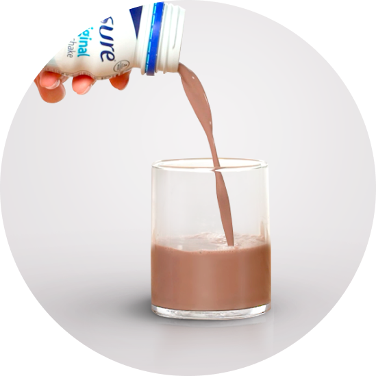 Image of a hand pouring a chocolate ensure nutrition shake.