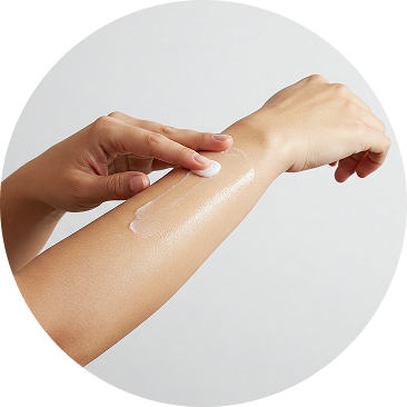 Image of a hand holding a tube of Calmoseptine.
