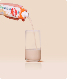 Nutrition shake being poured into a glass