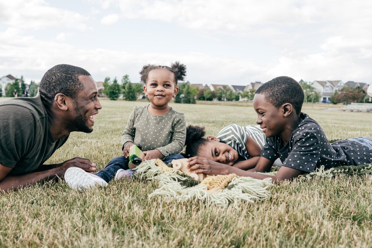 dad with kids at park 