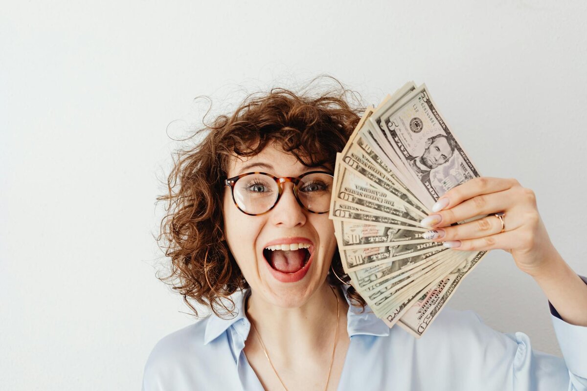 Woman holding cash