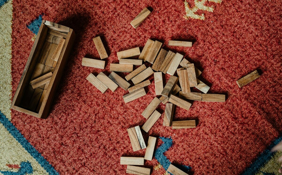 Toy blocks on floor waiting to be built