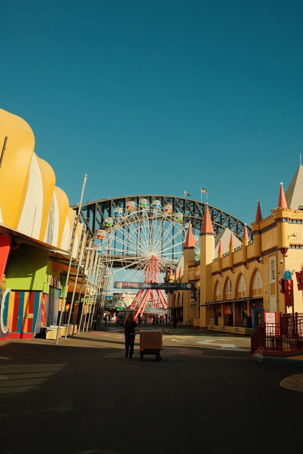 Entrance to Luna Park amusement park with Ferris wheel, Sydney, Australia