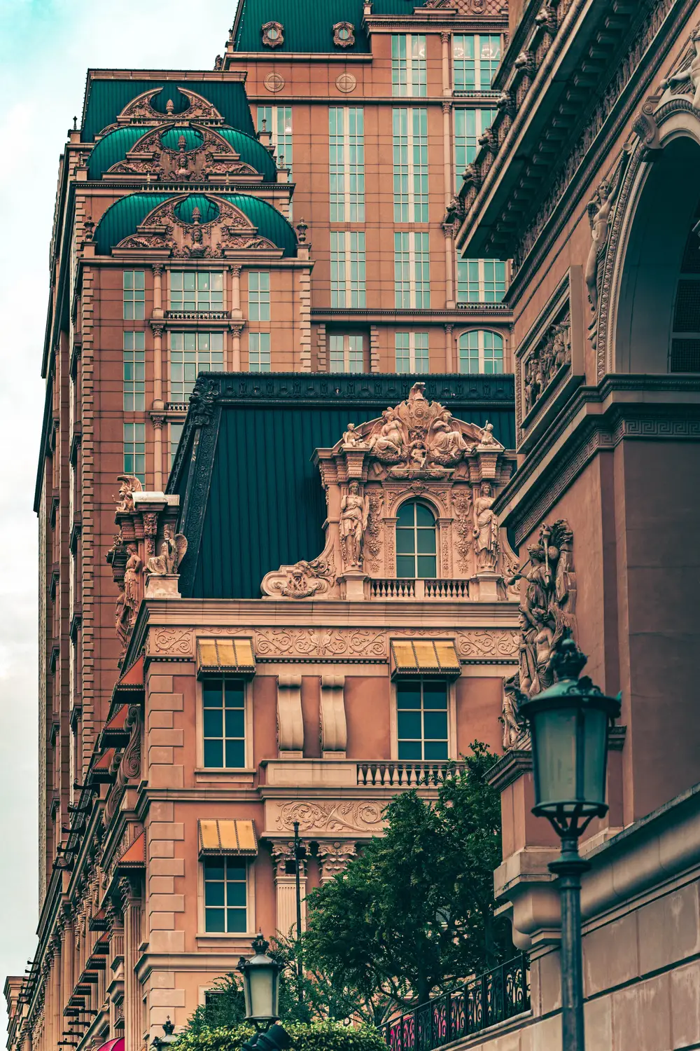 Ornate colonial-style building with domed corner tower and balconies, Macau