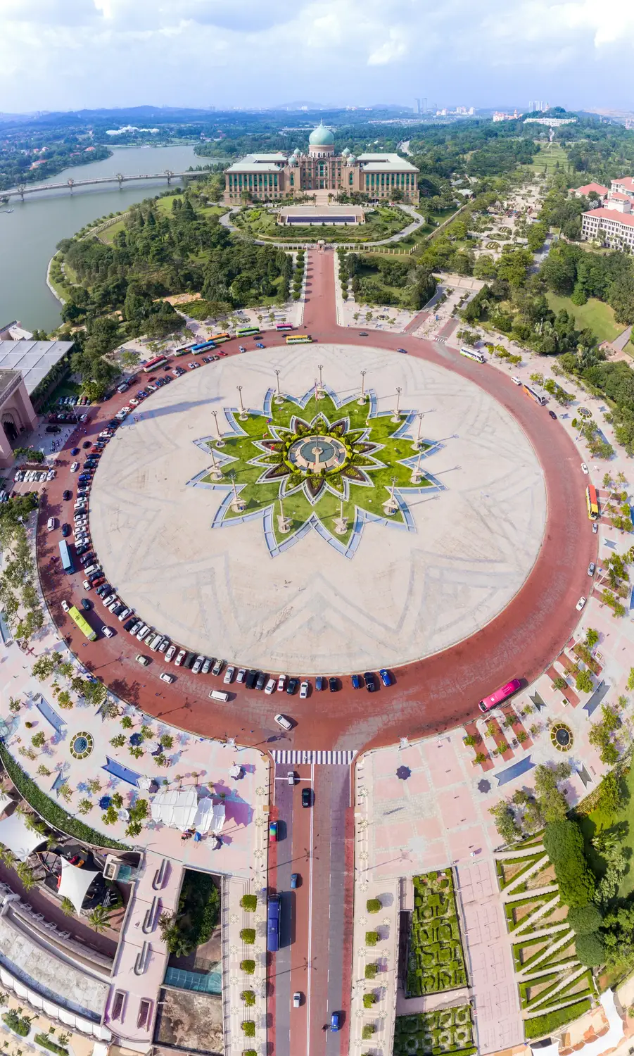 Aerial panoramic view of Putrajaya Federal Government administrative complex with circular plaza star-shaped garden and Perdana Putra building in Malaysia