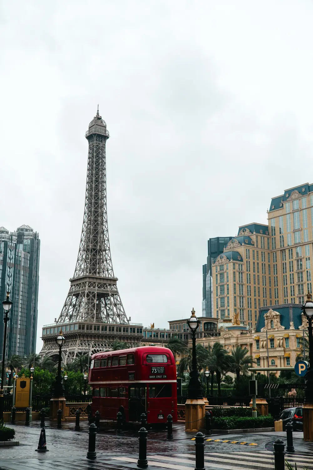 Eiffel Tower replica at The Parisian Macao with red double-decker bus