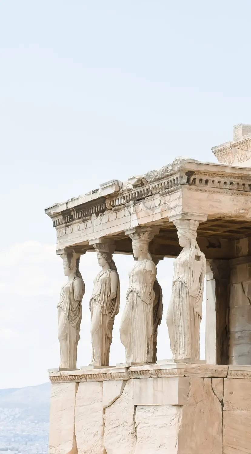 The Porch of the Caryatids at the Erechtheion on the Acropolis, featuring carved female figures supporting the roof.