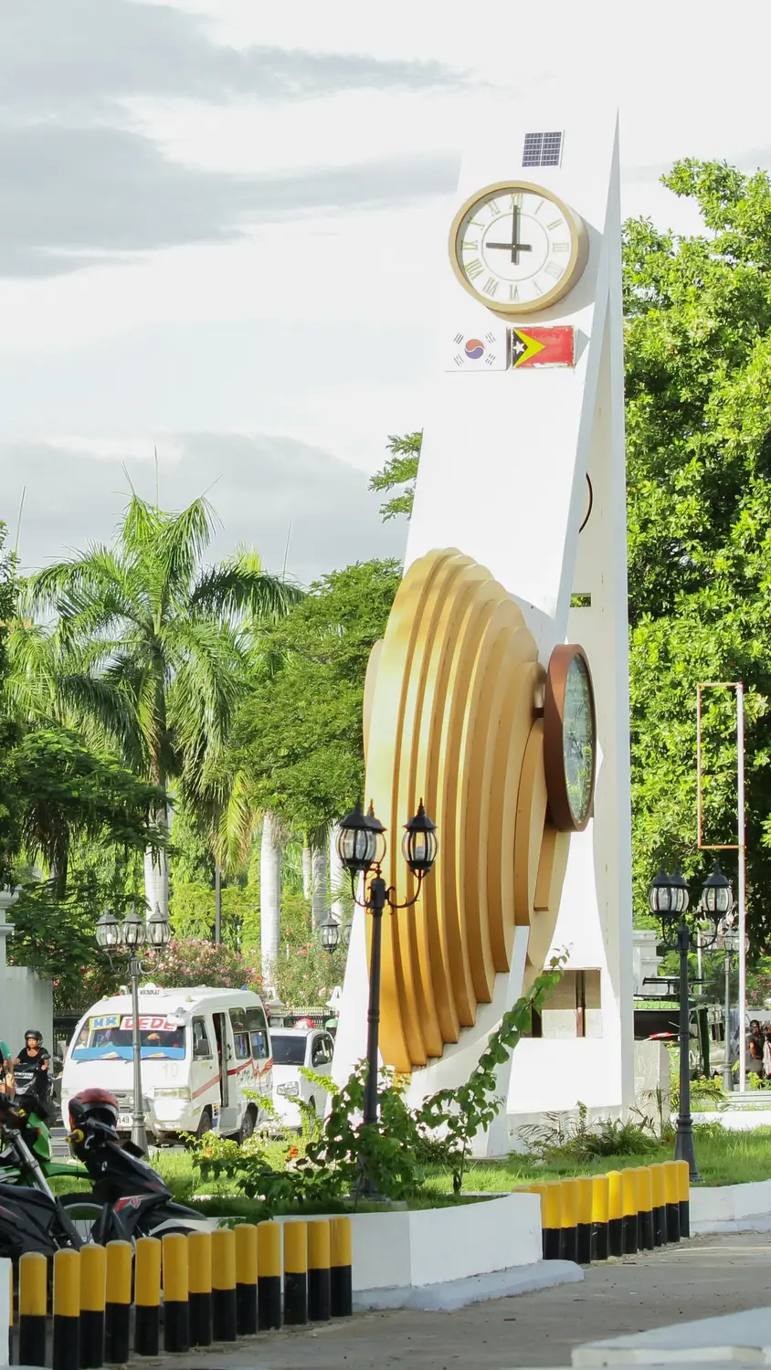 Dili city landmark monument with golden decorative sculpture East Timor