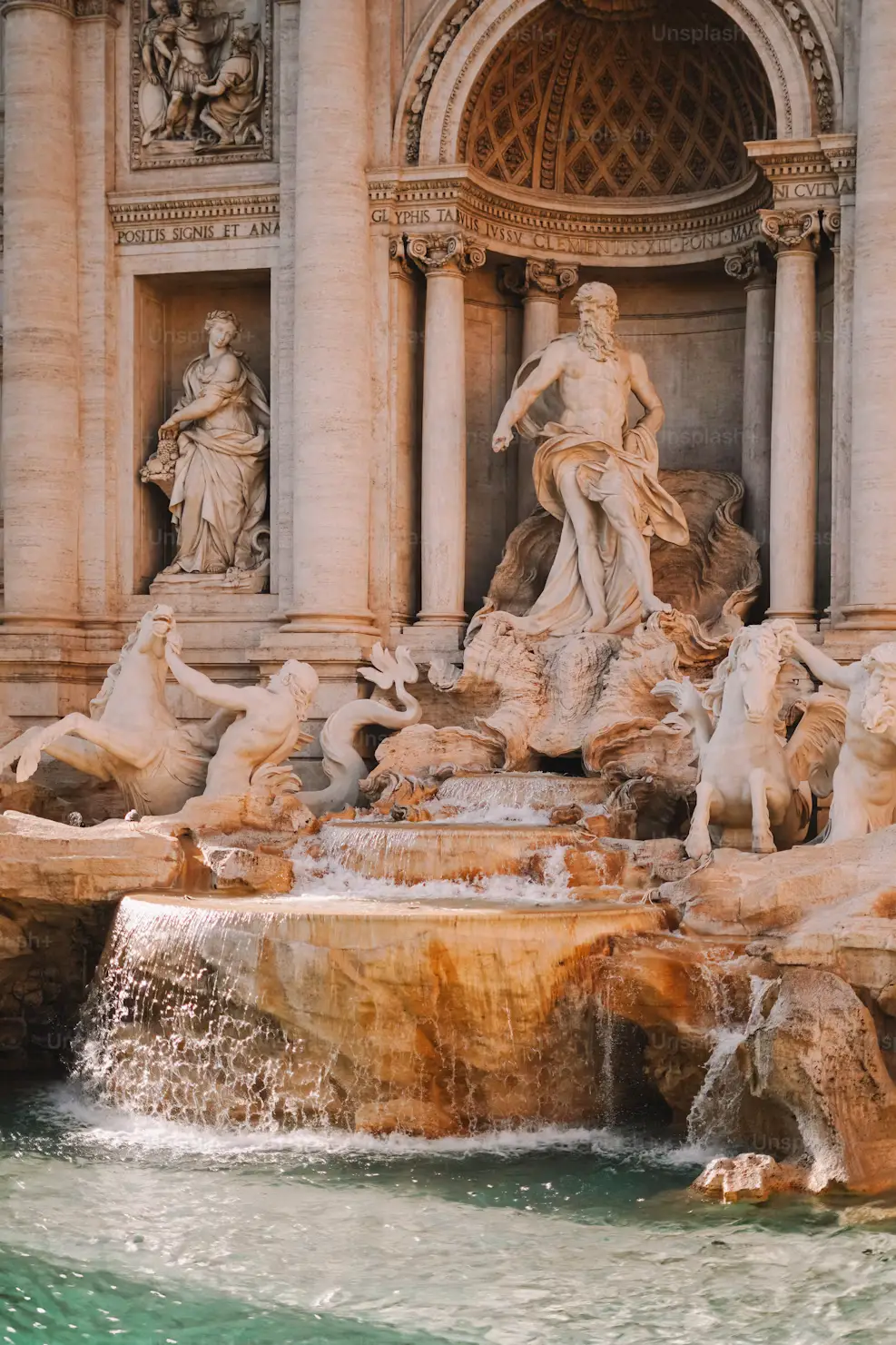Trevi Fountain's grand marble sculptures and cascading water in Rome