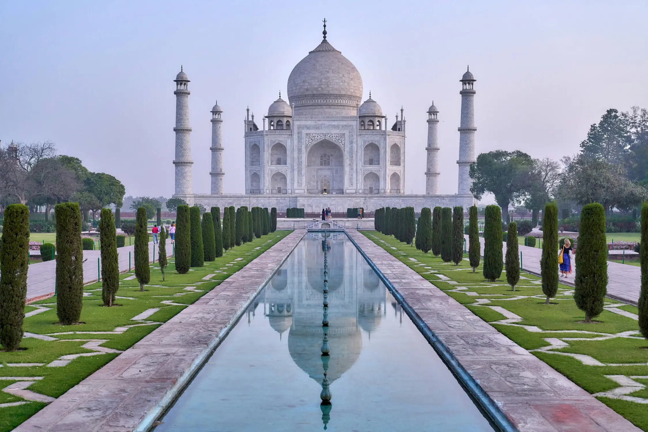 Taj Mahal white marble mausoleum with central reflecting pool and cypress trees, Agra, India – UNESCO World Heritage Site