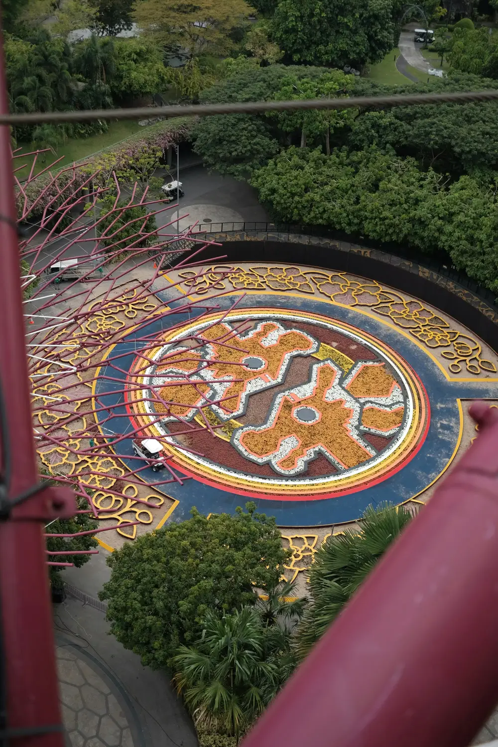 Aerial view of ornate circular dragon mosaic floor mural at Chinese Garden Singapore