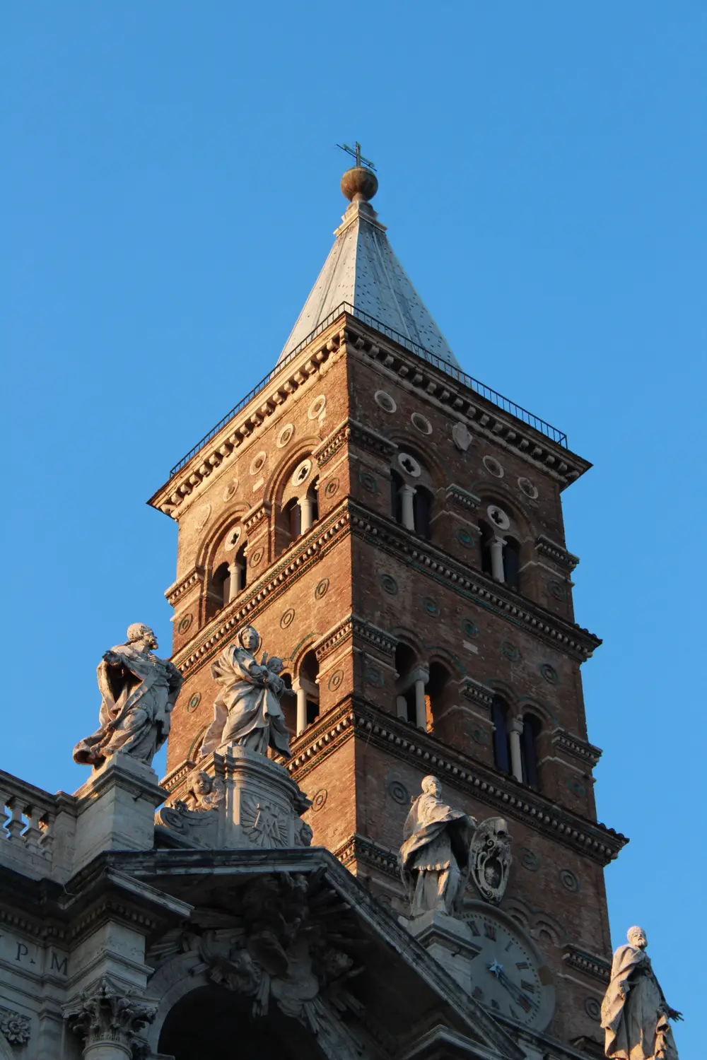 Bell tower of St. Mark's Campanile rising above Venice against a clear sky
