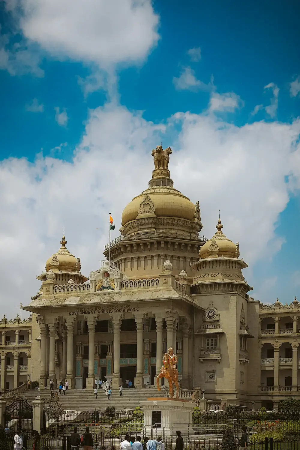 Vidhana Soudha Karnataka state legislature building with golden dome and equestrian statue, Bengaluru, India