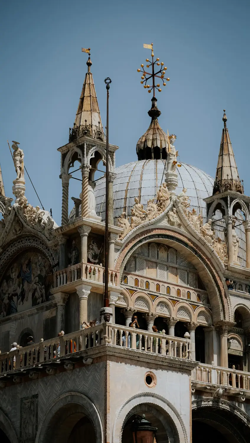 Ornate facade and domes of St. Mark's Basilica in Venice