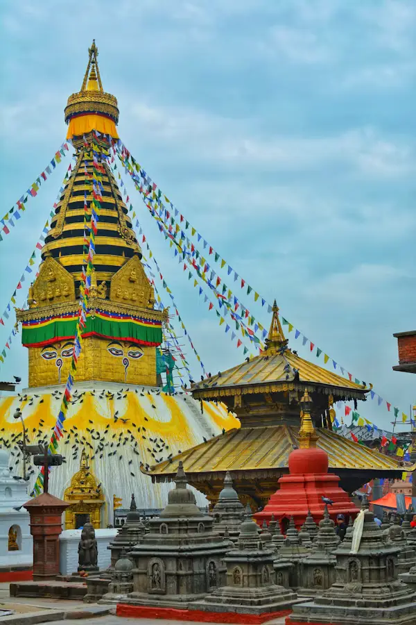 Swayambhunath (Monkey Temple) stupa with golden spire and prayer flags, Kathmandu, Nepal