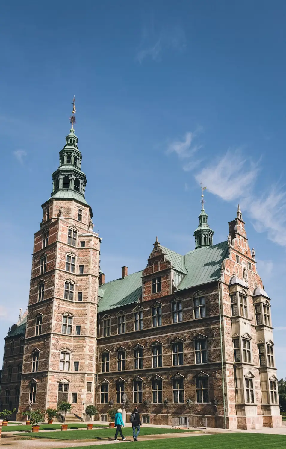 Rosenborg Castle tower in Copenhagen framed against a clear blue sky