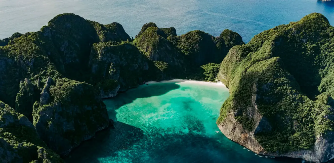 Scenic green water and mountains in Thailand.