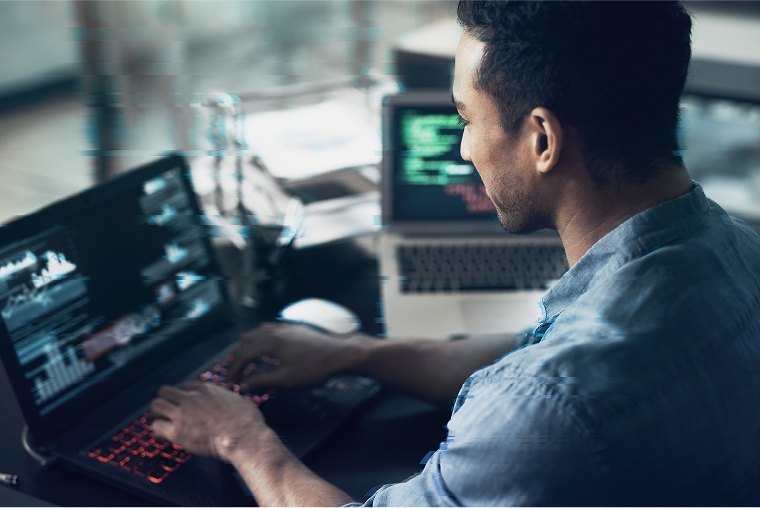 person working on laptops 
