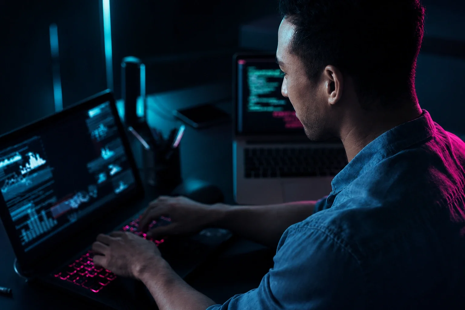 person working on laptops 