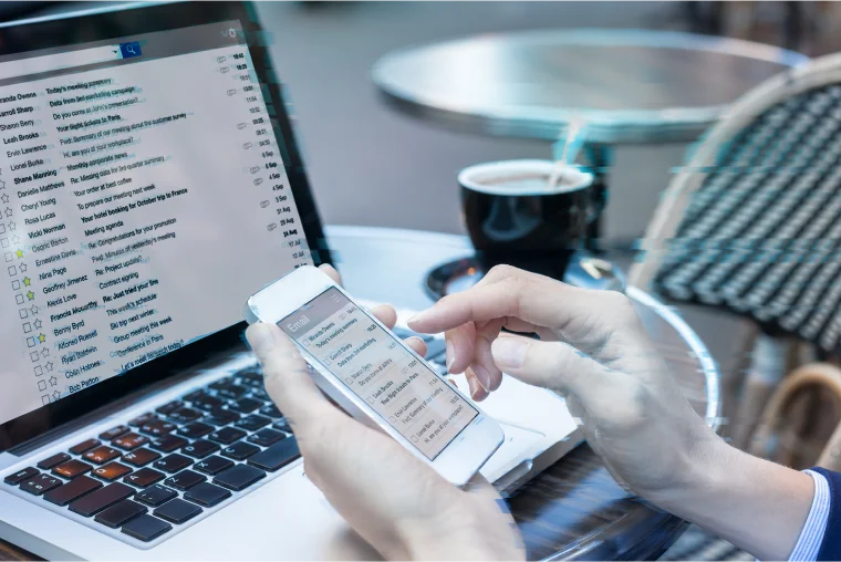 Doctor checking email on their phone 