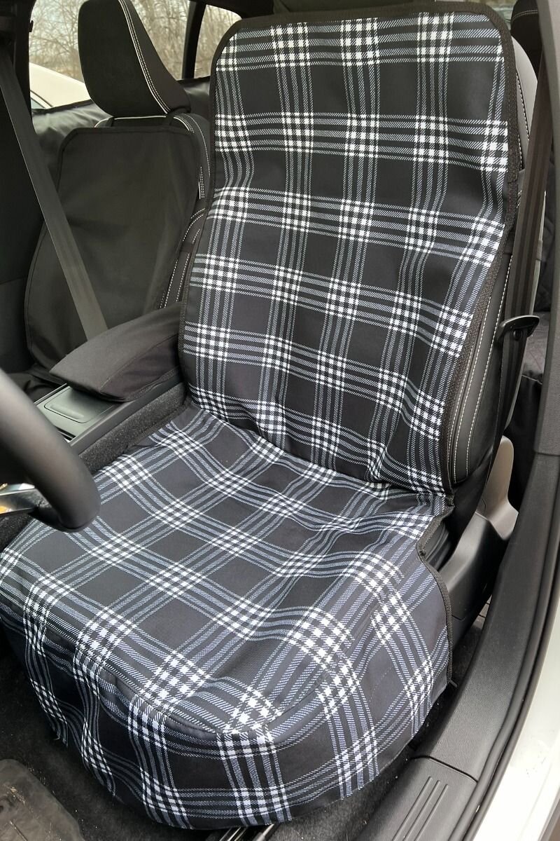 Canvasback cargo liner installed inside a vehicle with back hatch open to snowy mountain scenery