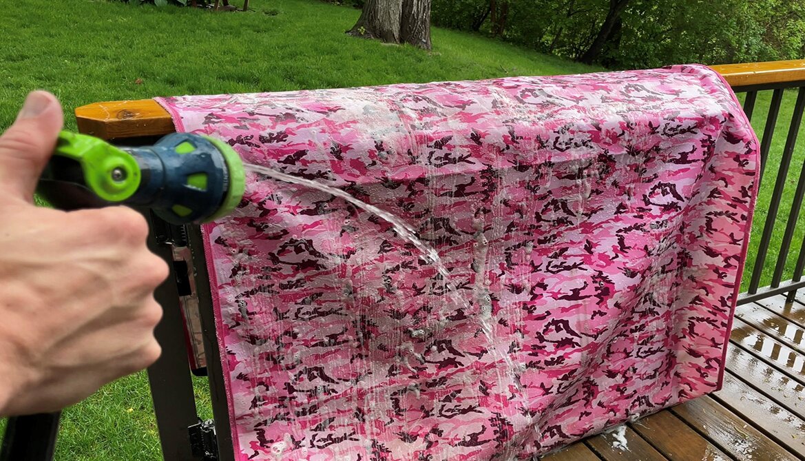 Water repellant Camo Canvasback fabric close up with water droplets