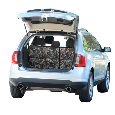 Vehicle with back hatch open to show camo pattern Canvasback cargo liner installed