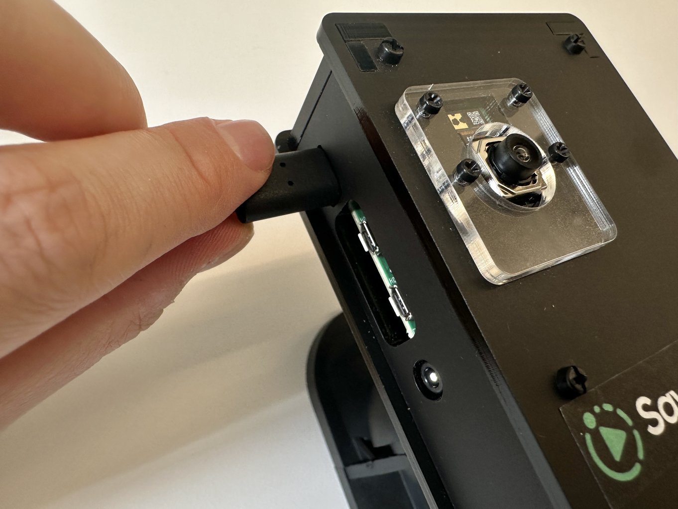 2. Plug in the camera (using only the provided power adapter)