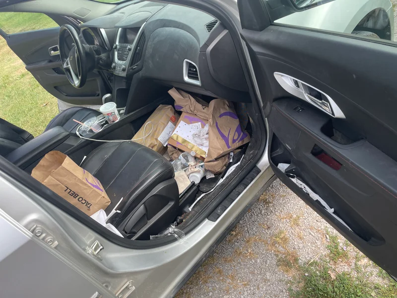 Vehicle interior before mobile detailing