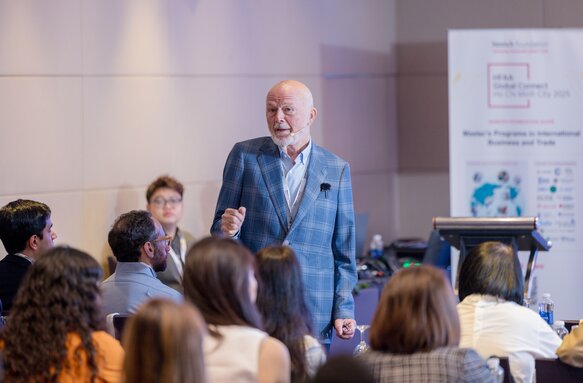 Merle A. Hinrich speaks with members of the Hinrich Foundation Alumni Association, May 2025