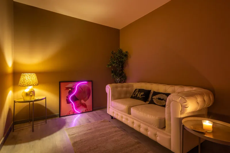 Spacious massage suite with adjustable ambient lighting