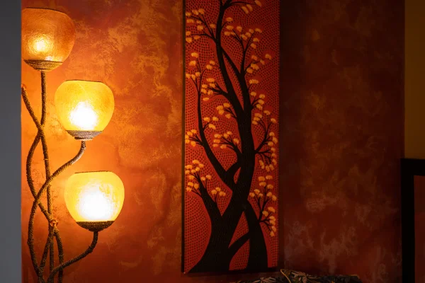 Towels and aromatic oils arranged on a wooden shelf in the Stimulos preparation area