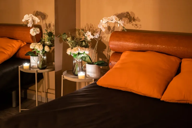 Modern spa-inspired bathroom with discreet private entrance