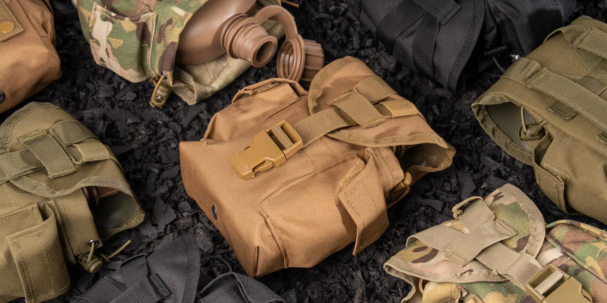 Molle Canteens on Rubber Mulch