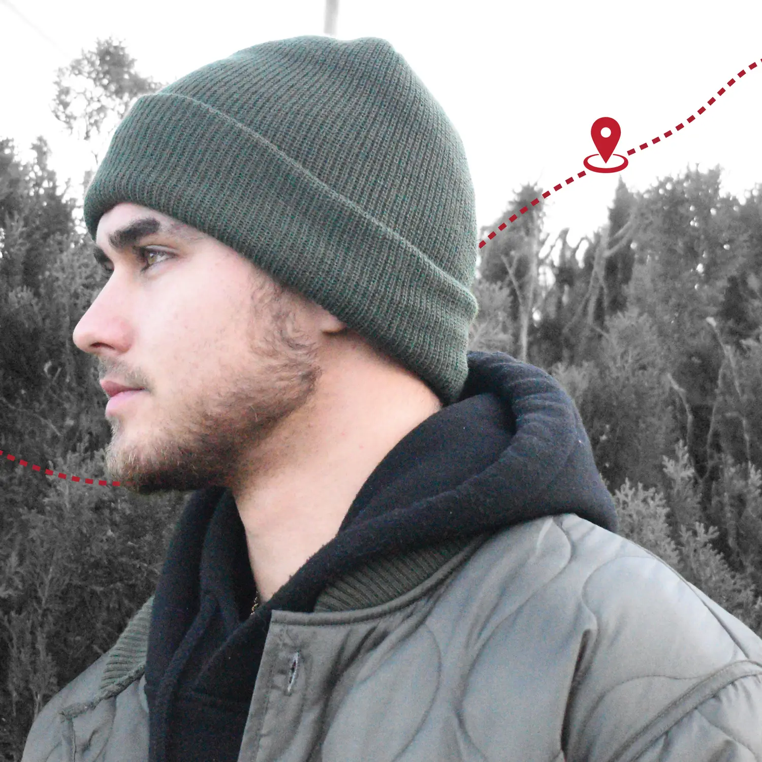 Man in green beanie hat