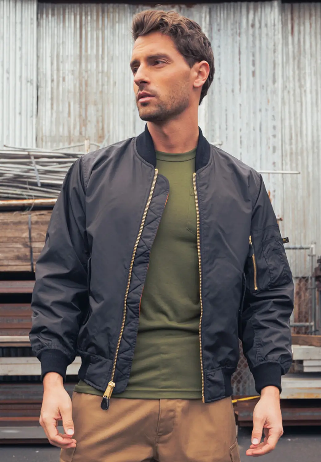 Man in black bomber jacket