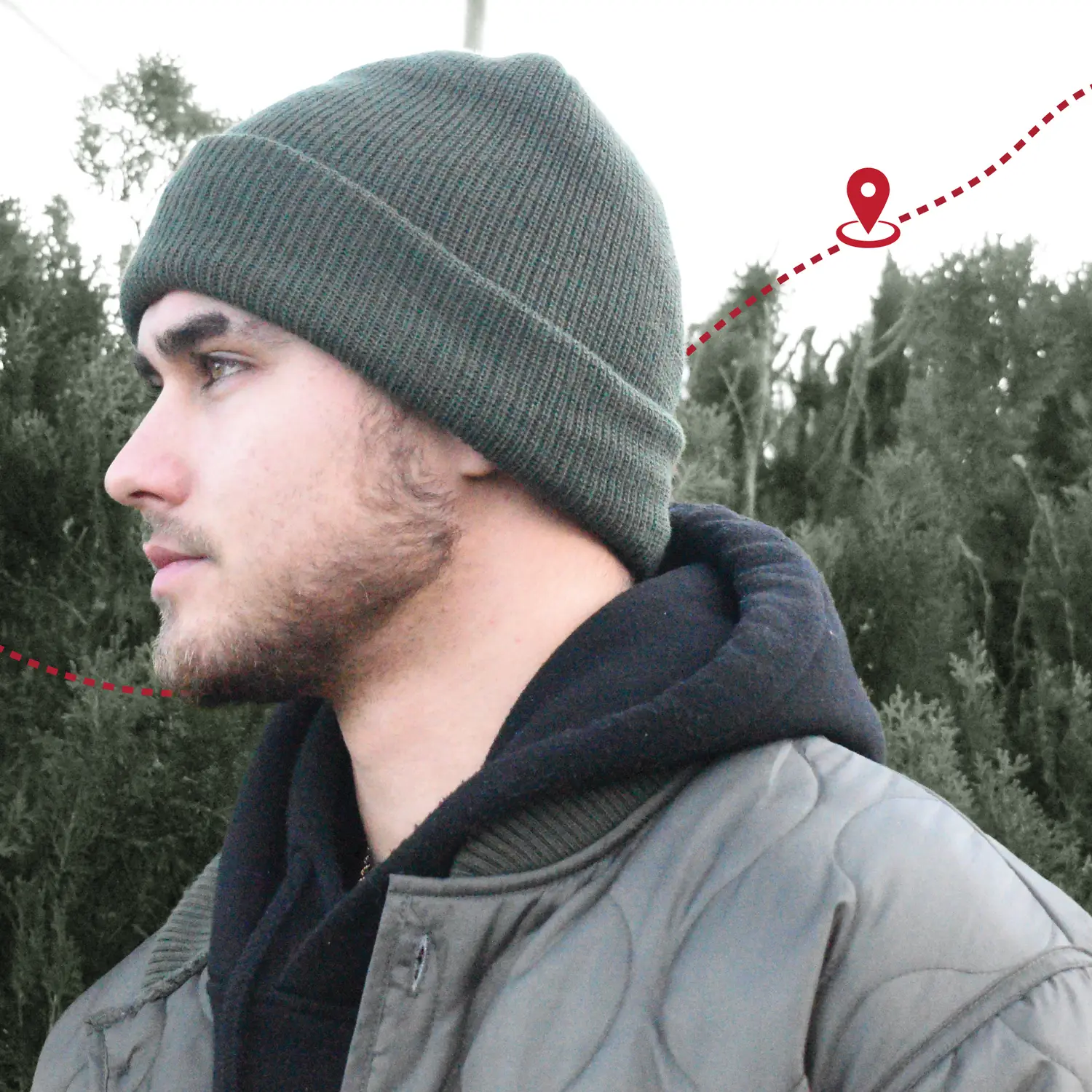 Man in green beanie hat