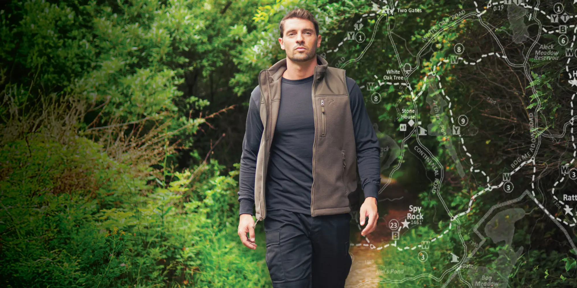 Man Wearing Long Sleeve T-Shirt & Vest Hiking Outdoors