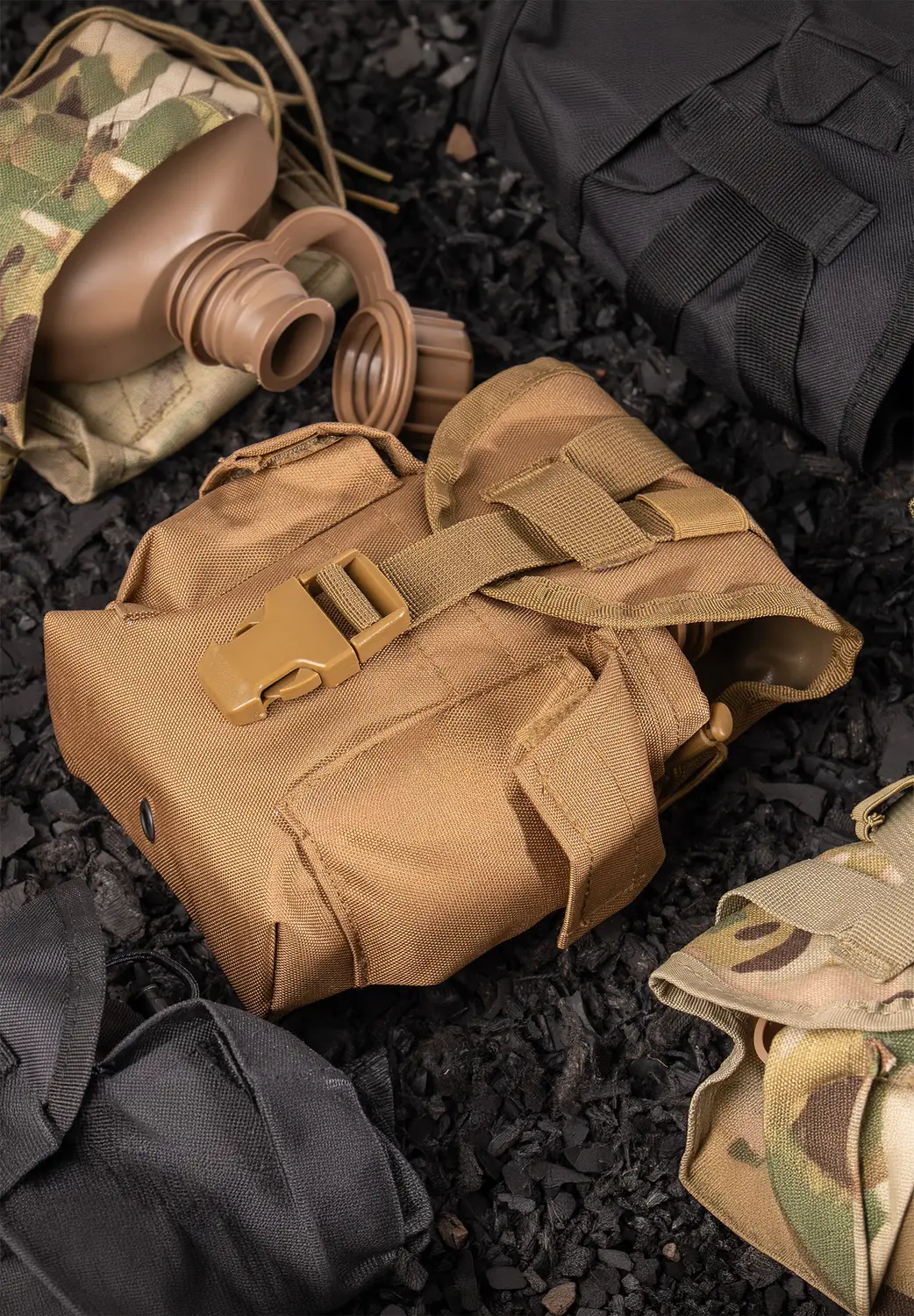 Molle Canteens on Rubber Mulch