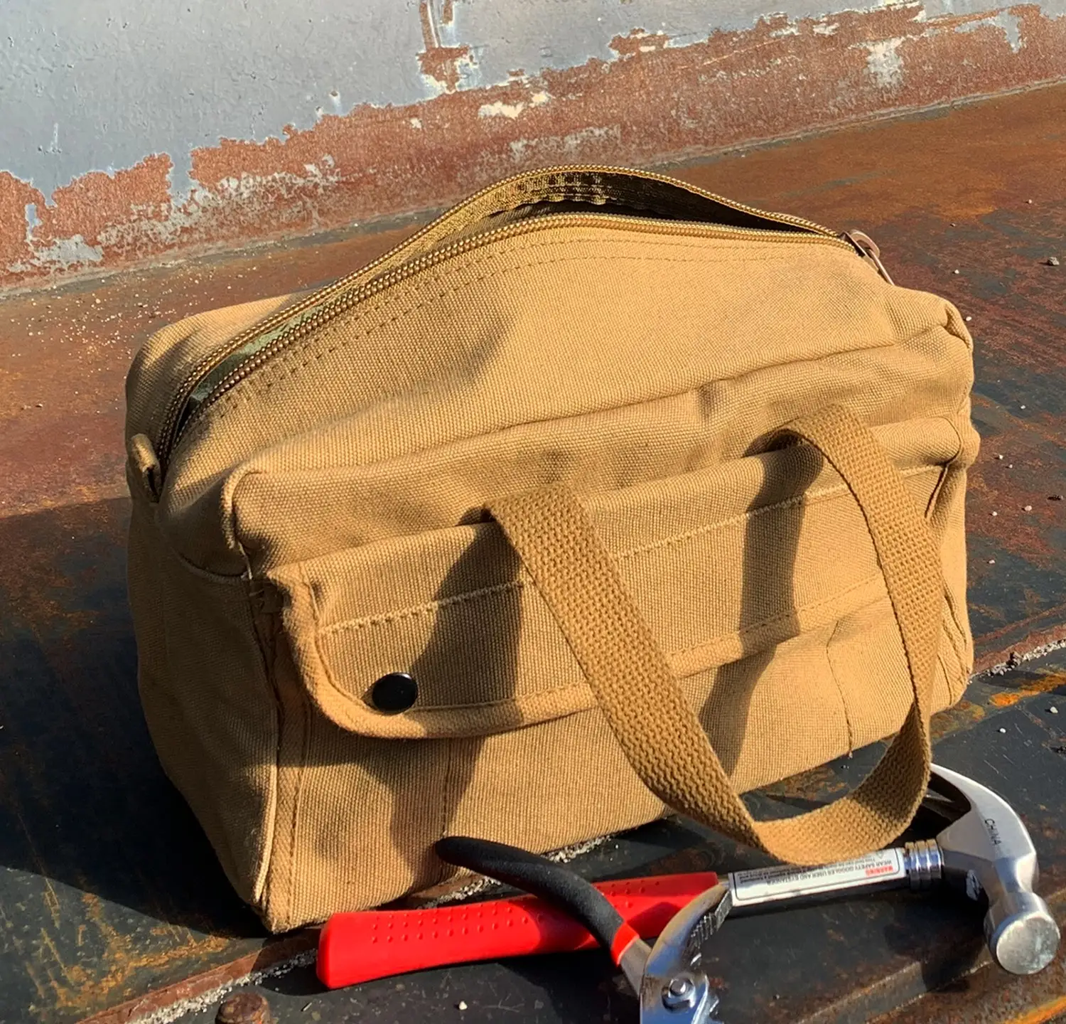 Tool bag sitting on unique background