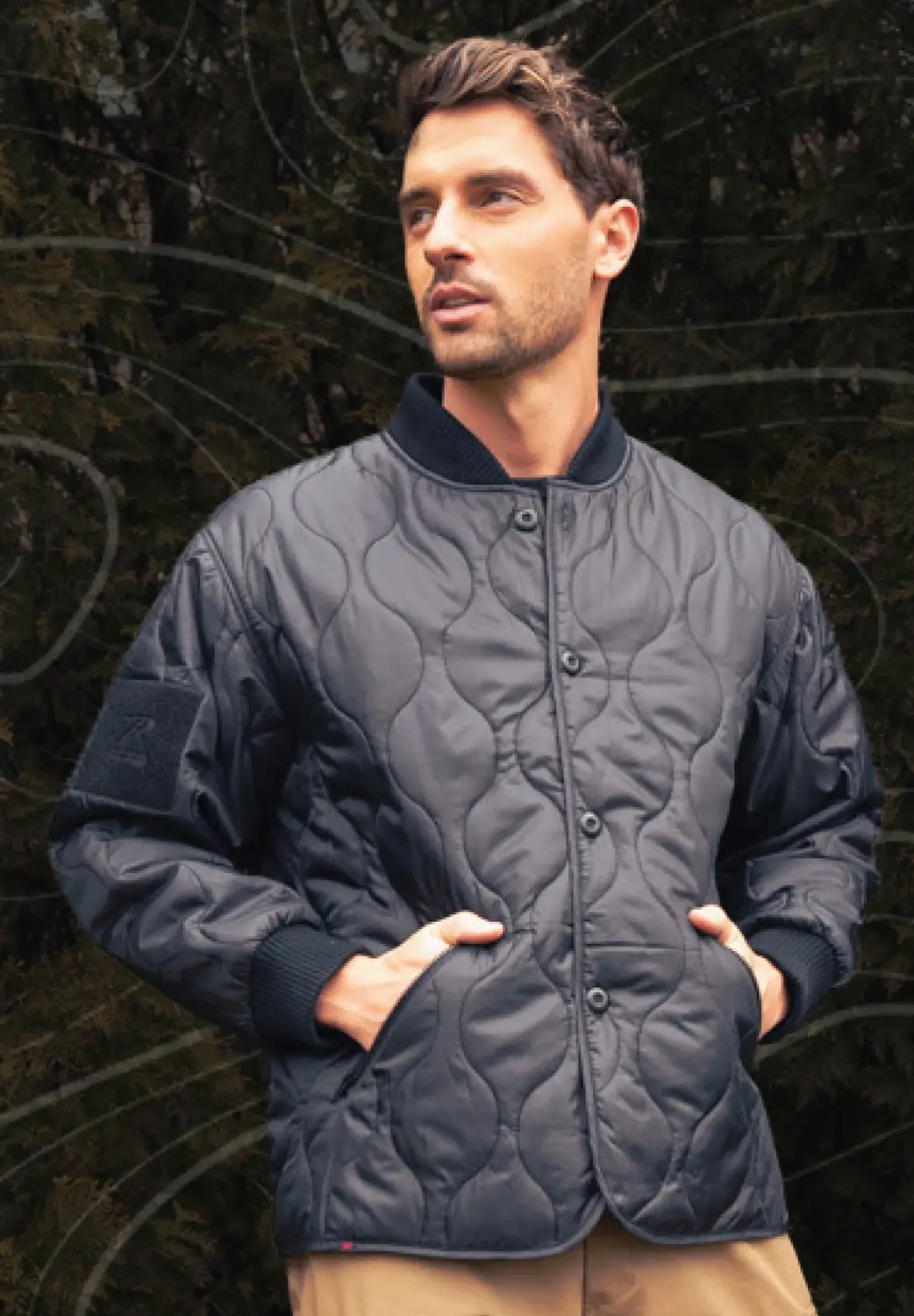 Man Wearing Woobie Jacket Outdoors with Graphic Overlay