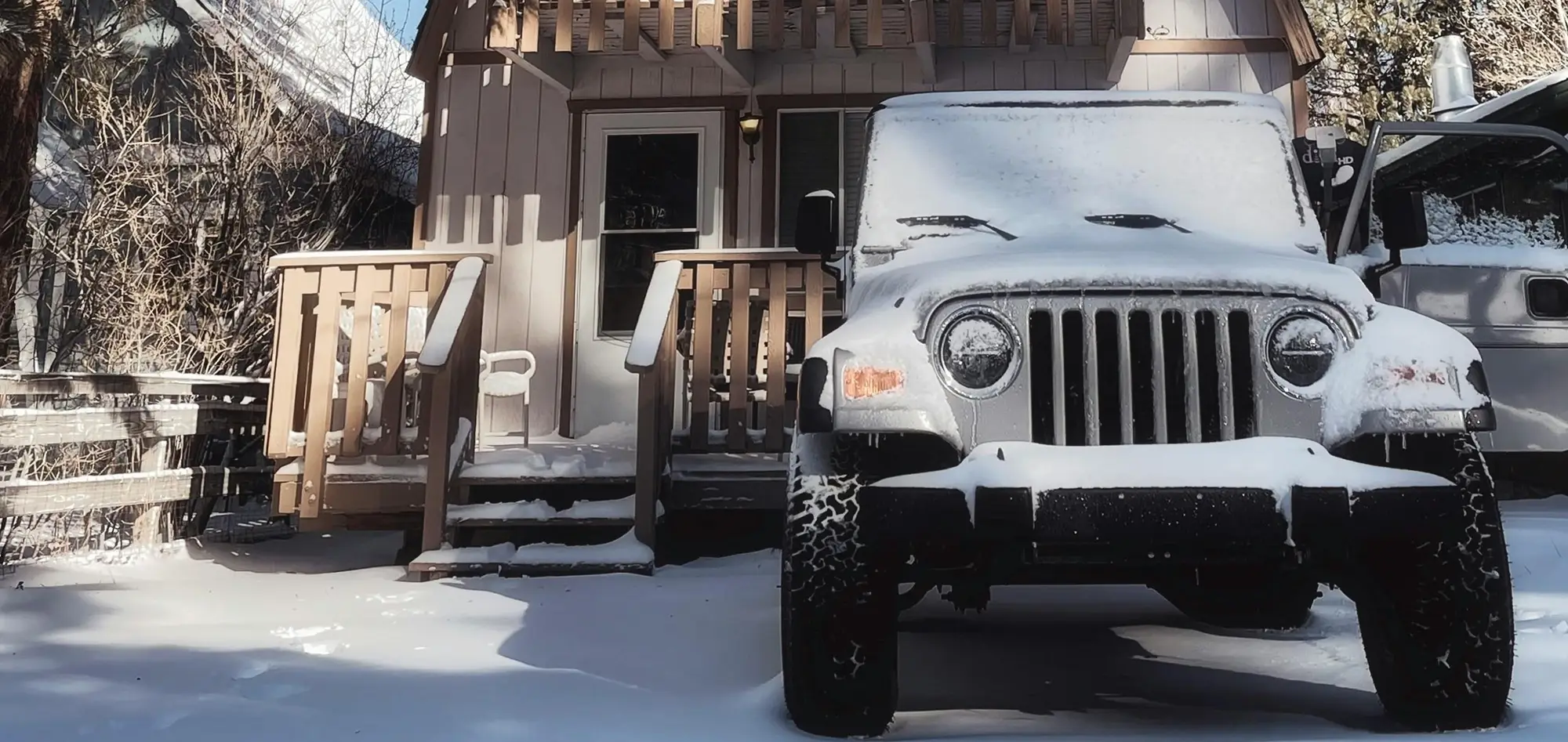 Winter Jeep Outside House