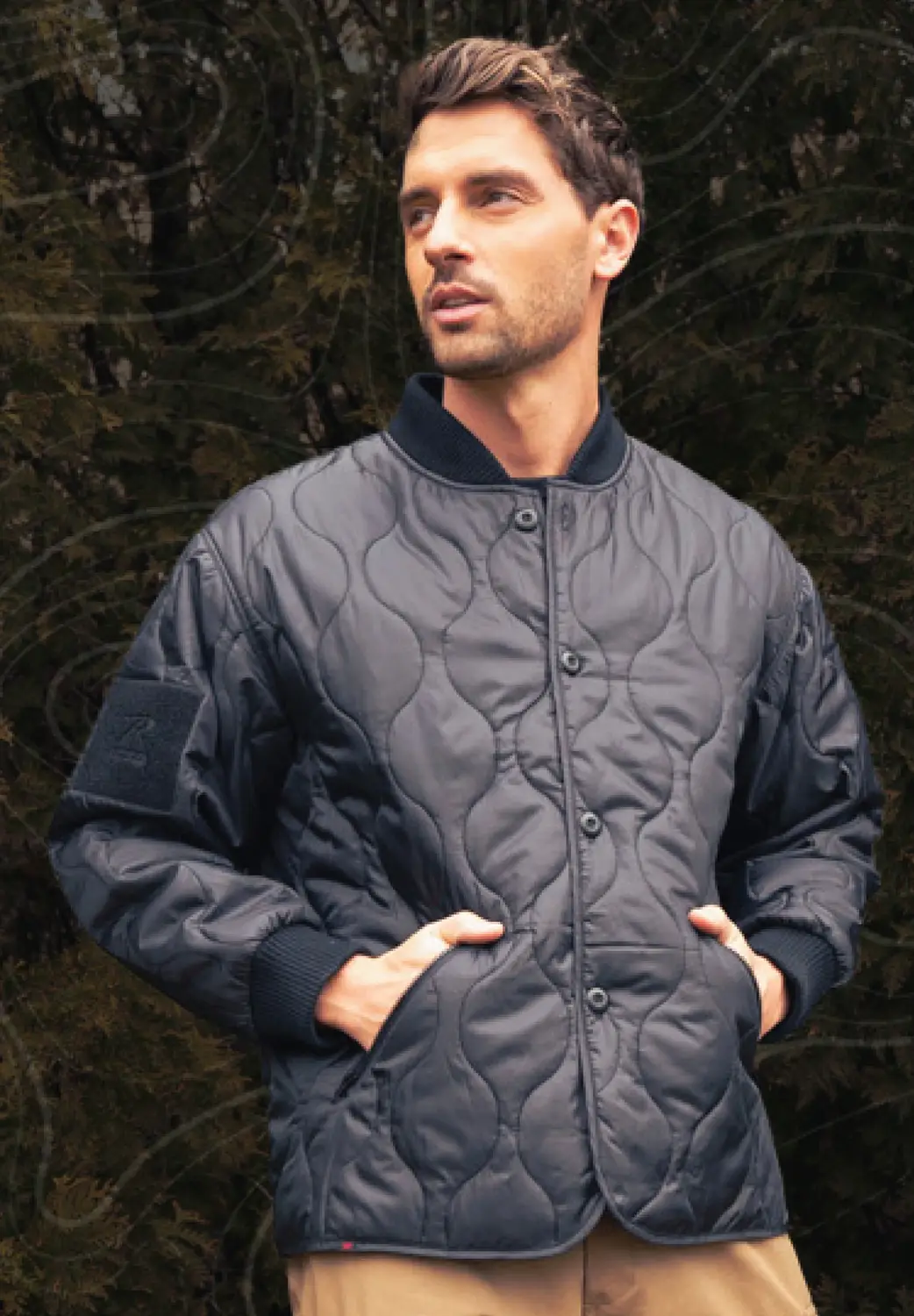 Man Wearing Woobie Jacket Outdoors with Graphic Overlay