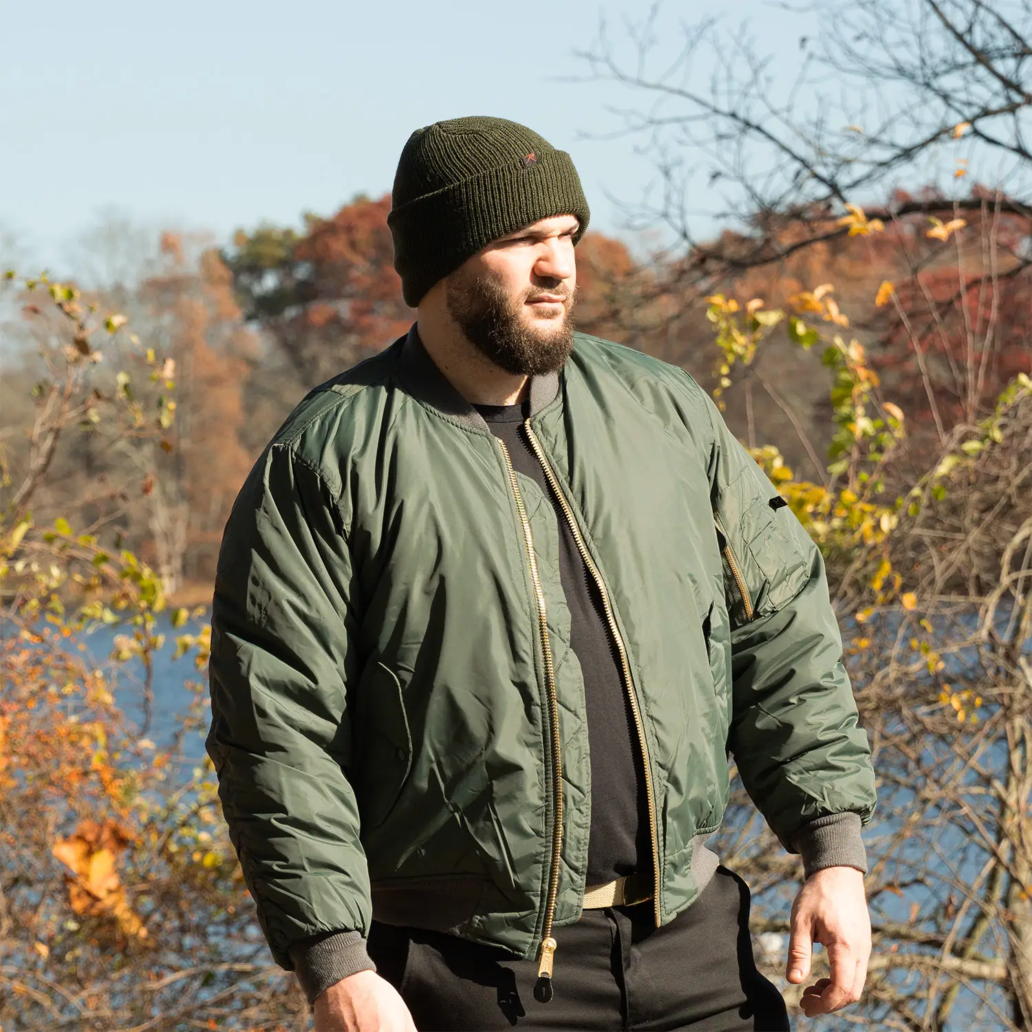 Man Wearing Beanie around Fall Scenery