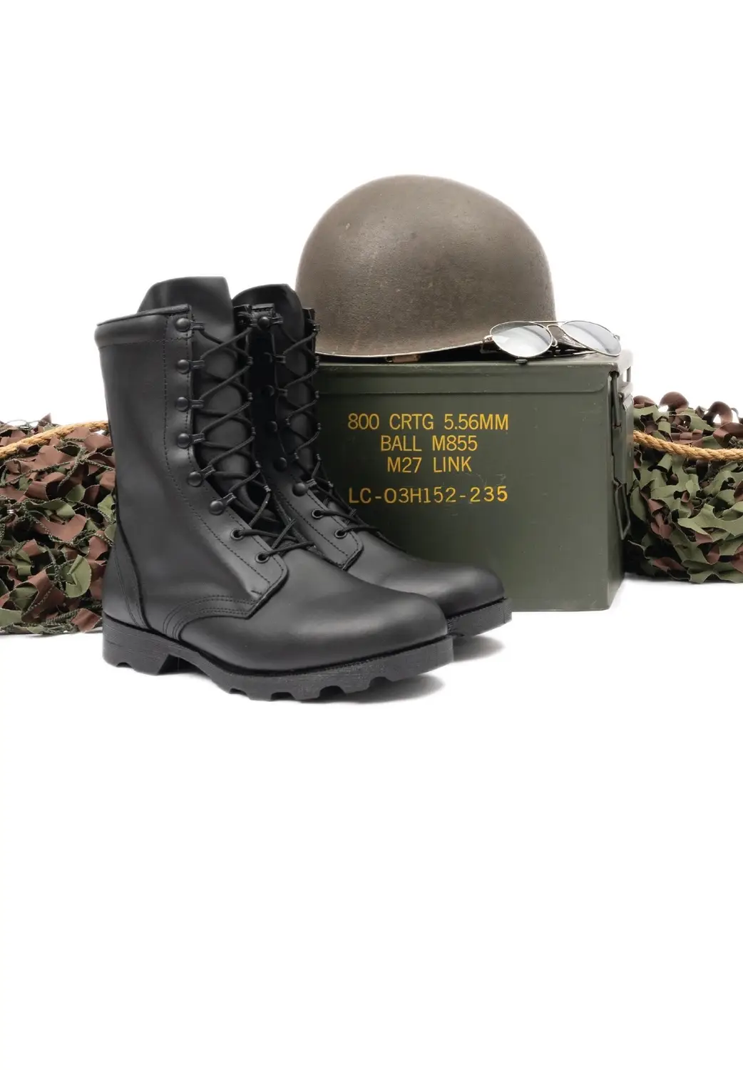 Military boots, helmet, and ammo can