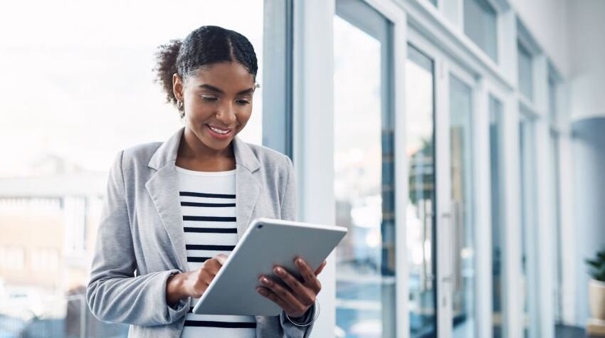 Marketing specialist working on her iPad.